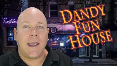 neil dandy in a grubby neighborhood with the dandy fun house logo