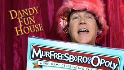 neil dandy holding the game of murfreesboro*opoly