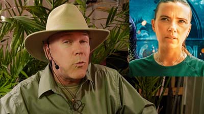 neil dandy next to picture of scarlett johansson
