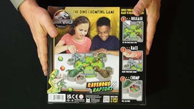 back of ravenous raptors game box showing pre-teen kids playing the game
