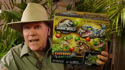neil dandy with ravenous raptors game box