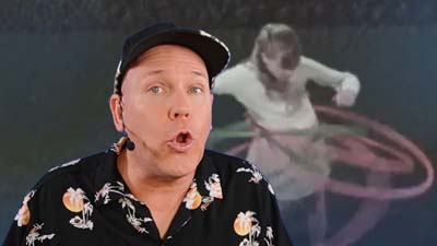 neil dandy with a image of a girl twirling several hula hoops