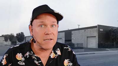 neil dandy with picture of the first wham-o warehouse