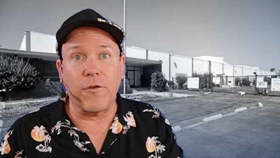 neil dandy with picture of the 2nd wham-o warehouse