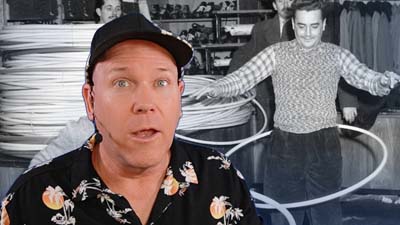 neil dandy with vintage image of people using hula hoops in the wham-o warehouse