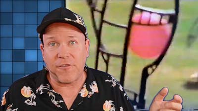neil dandy with a closeup image of the wham-o trac ball