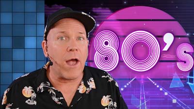 neil dandy with a graphical image of a logo for the decade of the 80's