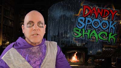 necro neil dandy inside of a haunted house with the dandy spook shack logo