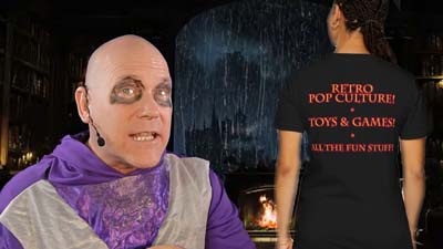 necro neil dandy next to model showing the back of a dandy fun house t-shirt