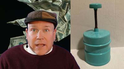 neil dandy with a picture of an early version of the popeil chop-o-matic