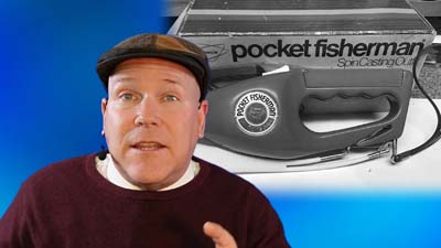 neil dandy with a picture of the ronco pocket fisherman