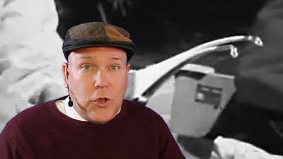 neil dandy with a picture of the ronco pocket fisherman