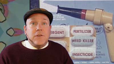 neil dandy with a picture of the ronco spray gun