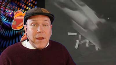 neil dandy with a picture of the miracle broom sucking up cigarette butts