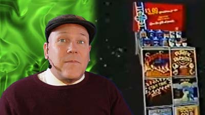 neil dandy with a picture of a ronco records store display