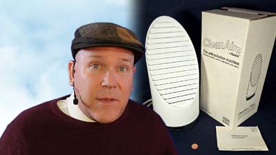 neil dandy with a picture of the ronco clean air machine
