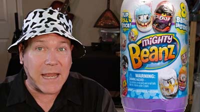 neil dandy with a package of mighty beanz