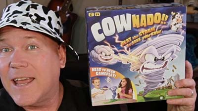 neil dandy holding cownado game box