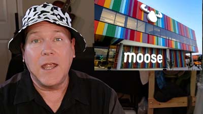 neil dandy with picture of moose toys headquarters
