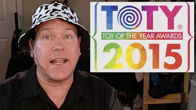 neil dandy with 2015 toty awards graphic