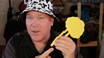 neil dandy holding cownado whack paddle