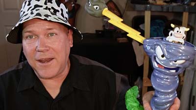 neil dandy holding the game of cownado