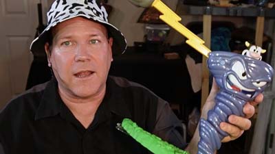 neil dandy holding the game of cownado