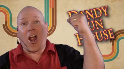neil dandy with dandy fun house logo and retro 70s background