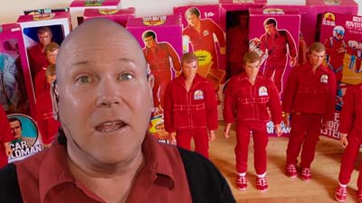 neil dandy with collection of steve austin action figures