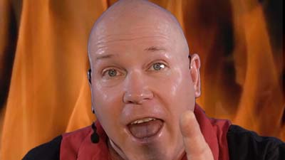 neil dandy closeup with fire background