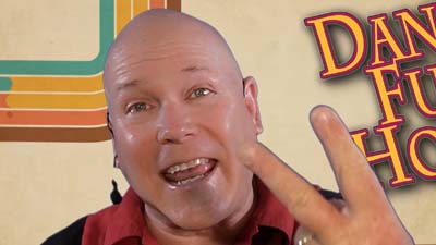 neil dandy with dandy fun house logo and retro 70s background