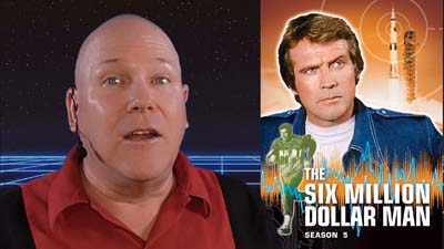 neil dandy with picture of lee majors as six million dollar man