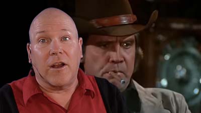neil dandy with picture of lee majors in cowboy hat