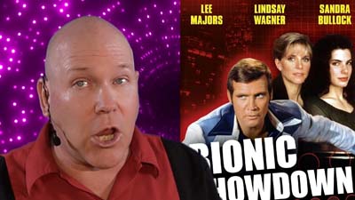 neil dandy with picture of six million dollar man and bionic woman