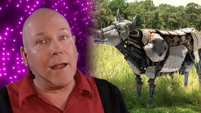 neil dandy with picture of a mechanical cow