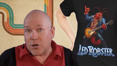 neil dandy with model wearing led robster t-shirt and retro 70s background