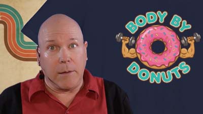neil dandy with body by donuts t-shirt and retro 70s background