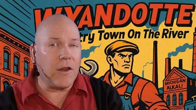 neil dandy with wyandotte graphic depicting a cartoon wrench-weilding worker
