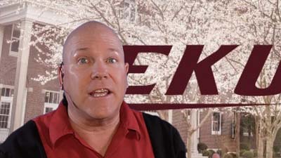 neil dandy with graphic rendering of eastern kentucky university logo