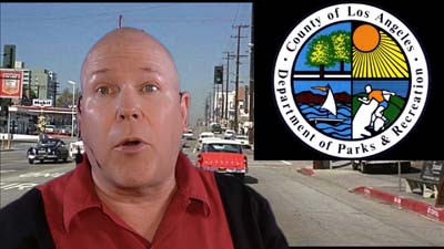 neil dandy with graphic of los angeles parks and recreation logo