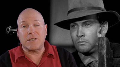 neil dandy with picture of lee majors wearing brimmed hat