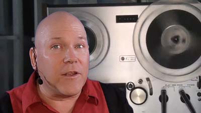 neil dandy with reel to reel tape machine