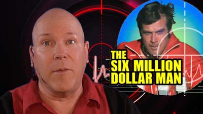neil dandy with picture of lee majors as six million dollar man
